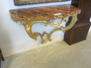 Gilded console with marbled wood top